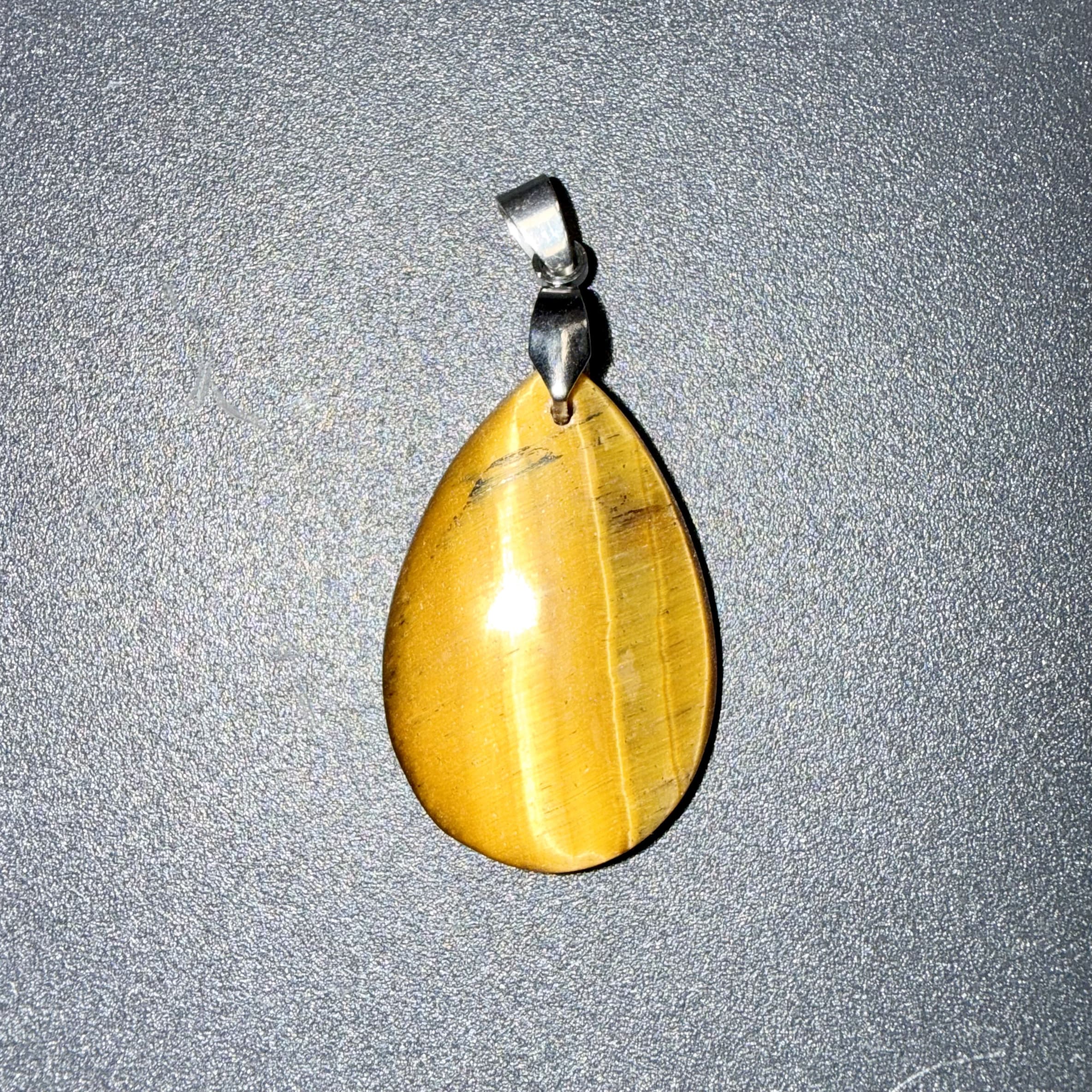Pendentif poli en Œil de tigre – courage & protection